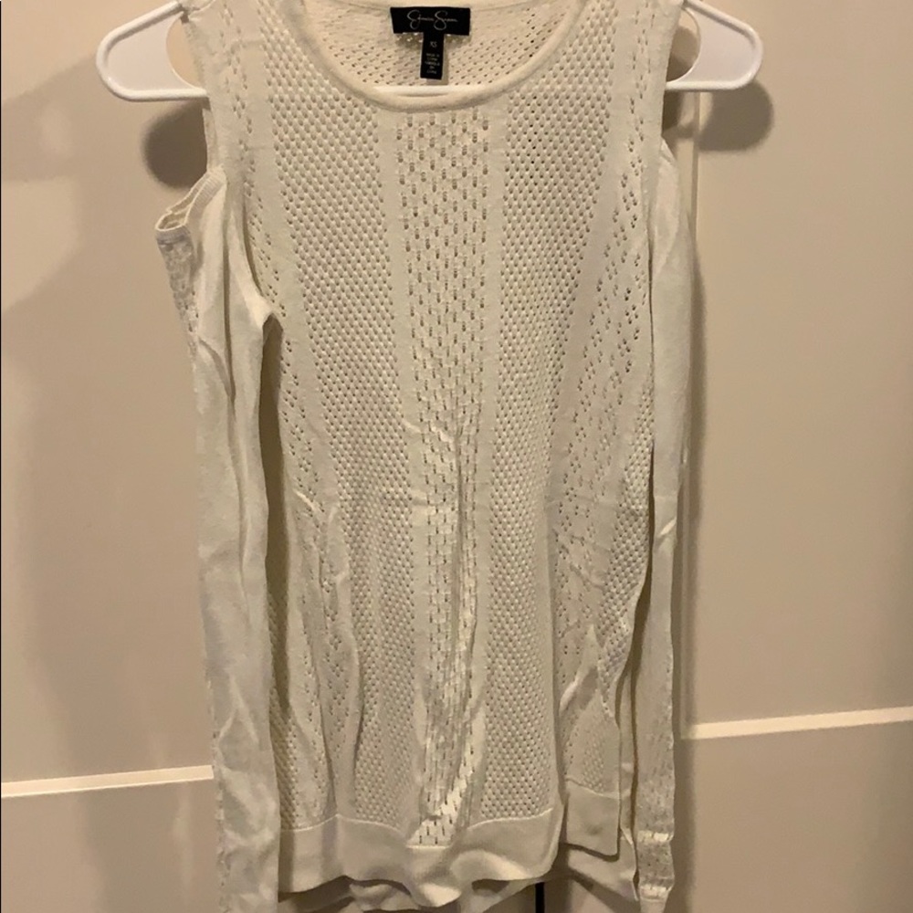 Light sweater that has exposed shoulders